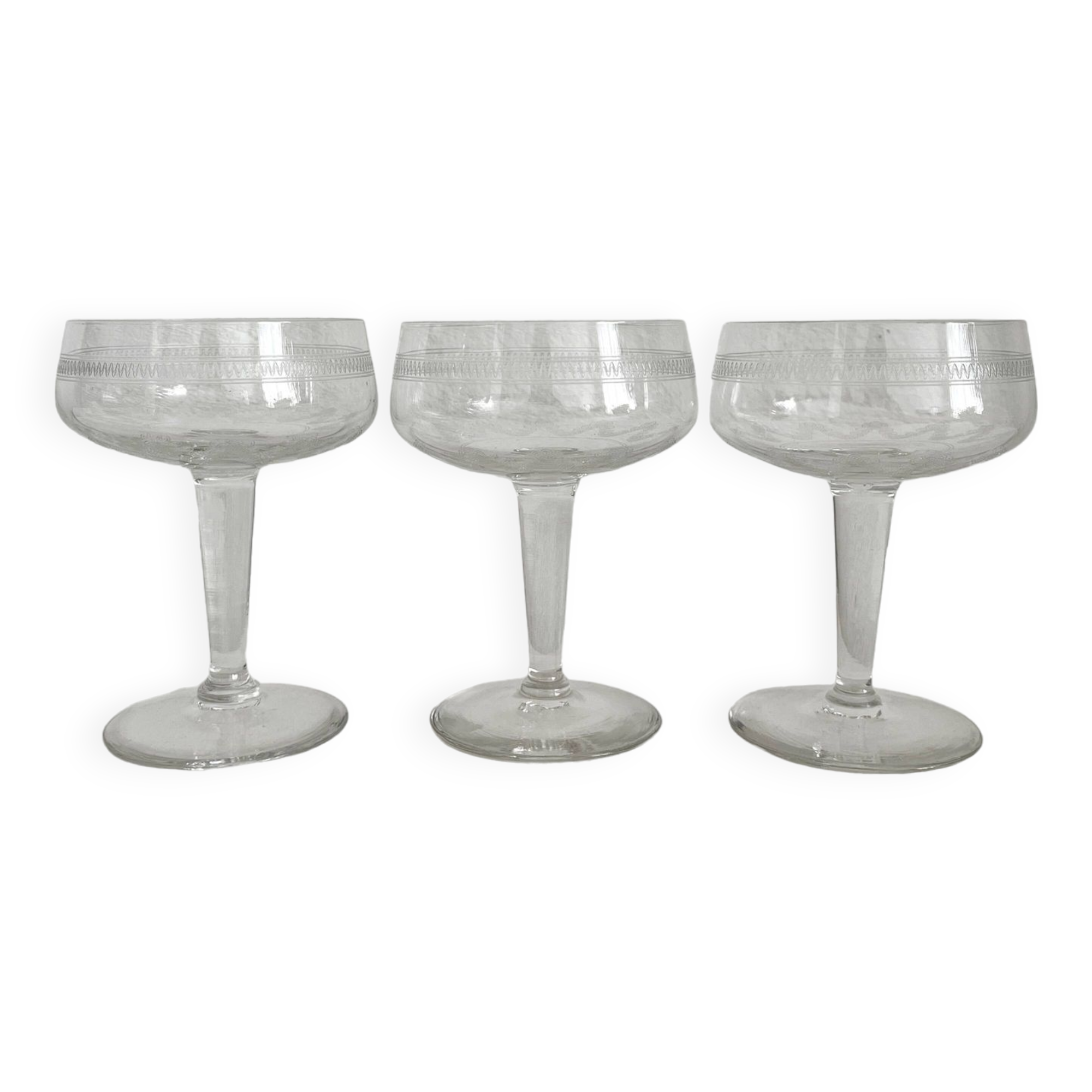3 antique crystal champagne coupes with engraved decoration