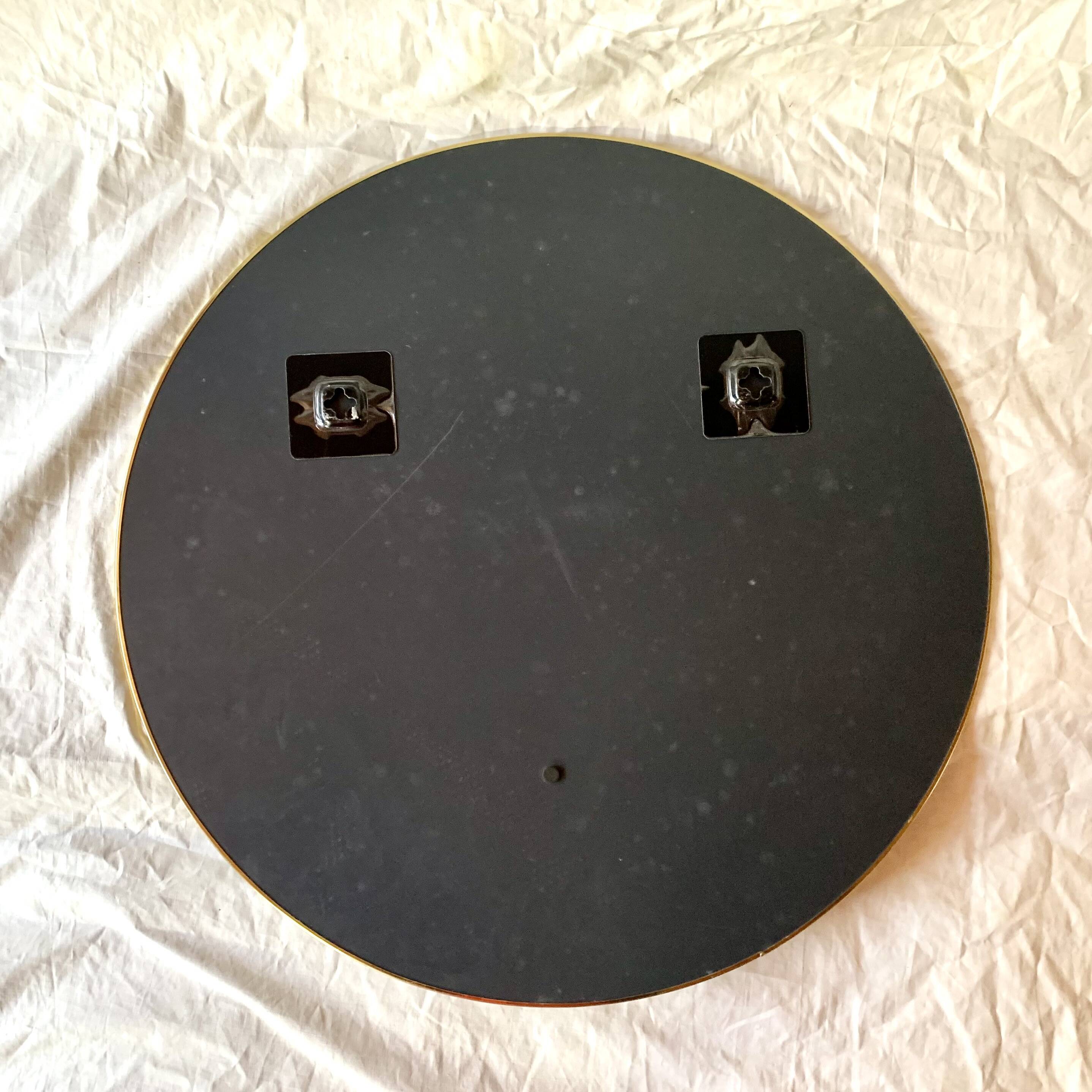 Round mirror with brass rim - 55 cm