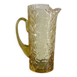 Pitcher in crumpled glass