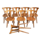 Set of 8 rustic bistro chairs in beech wood with honey patina, 1950s.