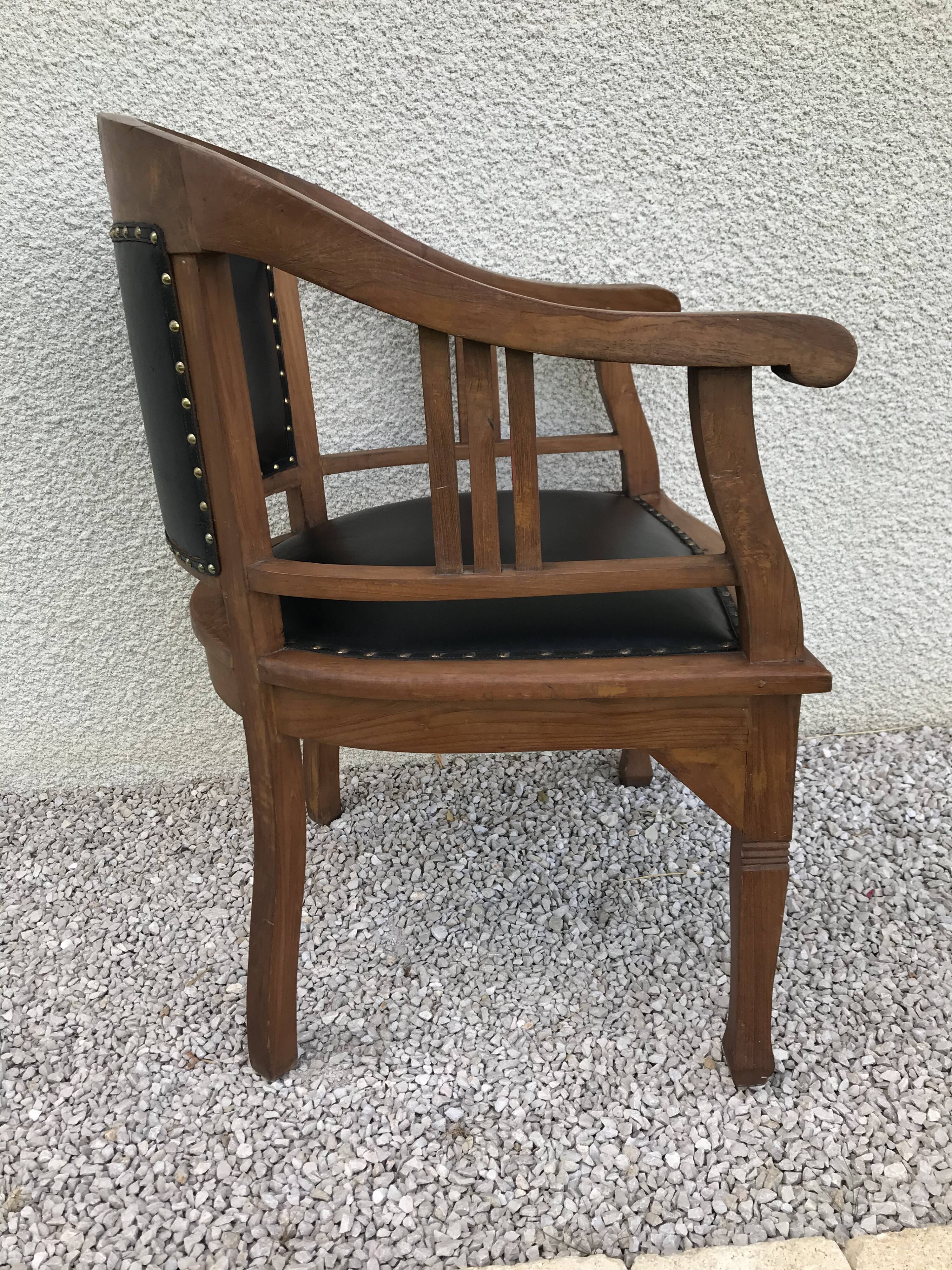 Art deco black leather office armchair