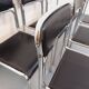 Set of 6 vintage Italian stackable chairs in chrome metal and faux leather.