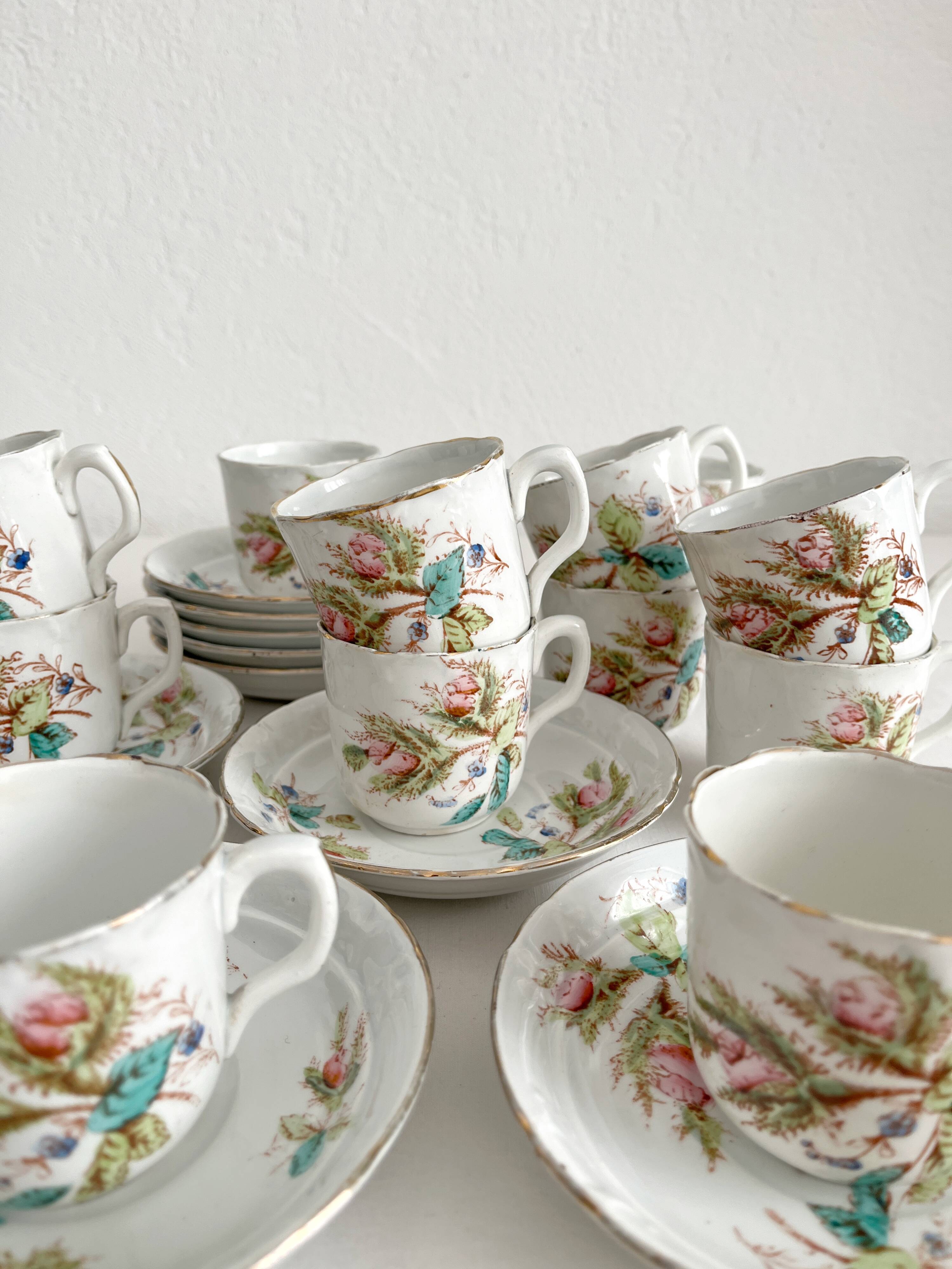 12 ironstone coffee cups with polychrome floral decoration, KG Lunéville