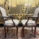 Pair of Louis XV style oak armchairs
