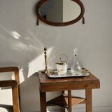 Small oval Art Deco mirror in brown and gold 33x54.