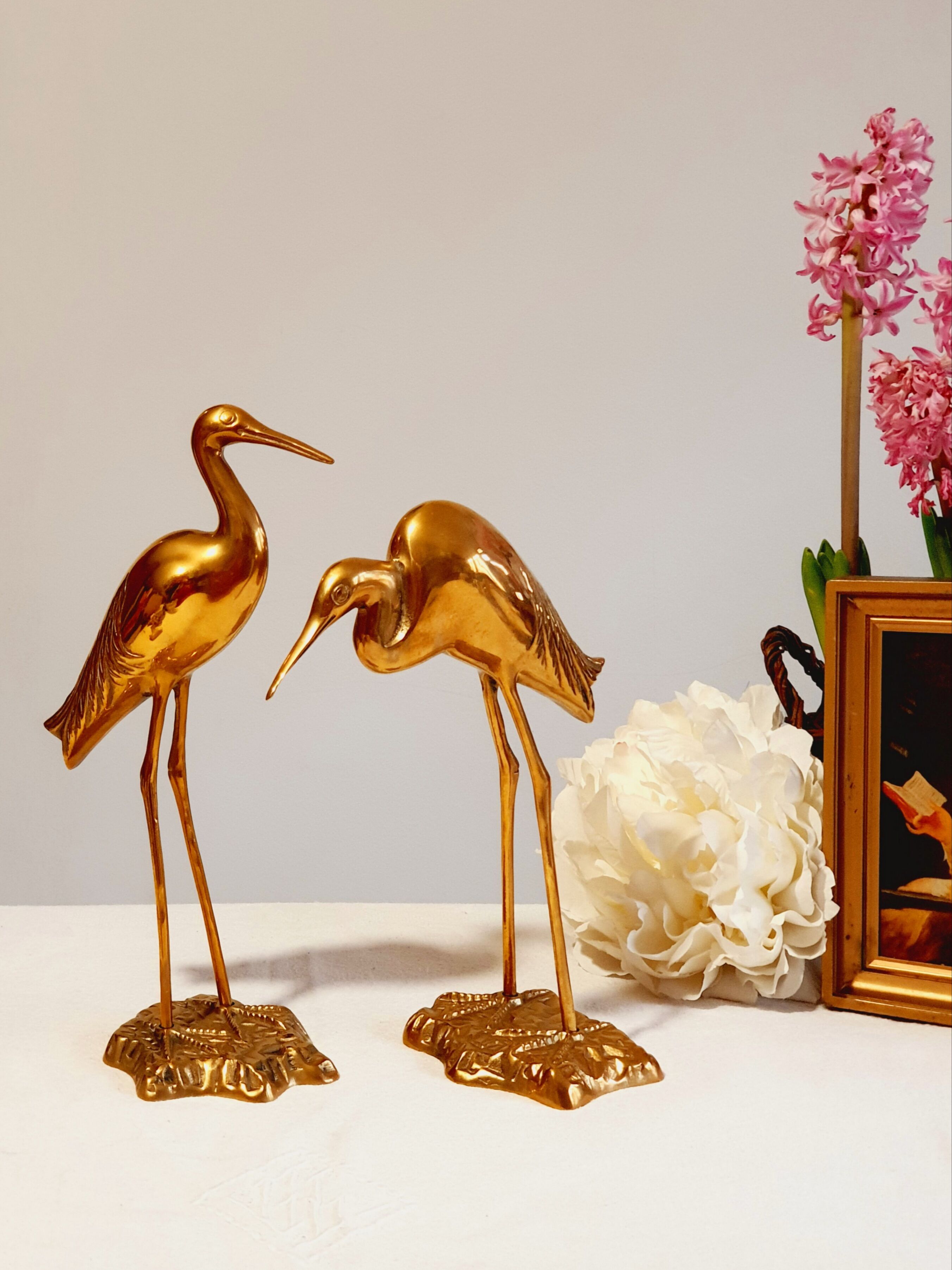 Couple of heron in vintage golden brass