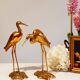 Couple of heron in vintage golden brass