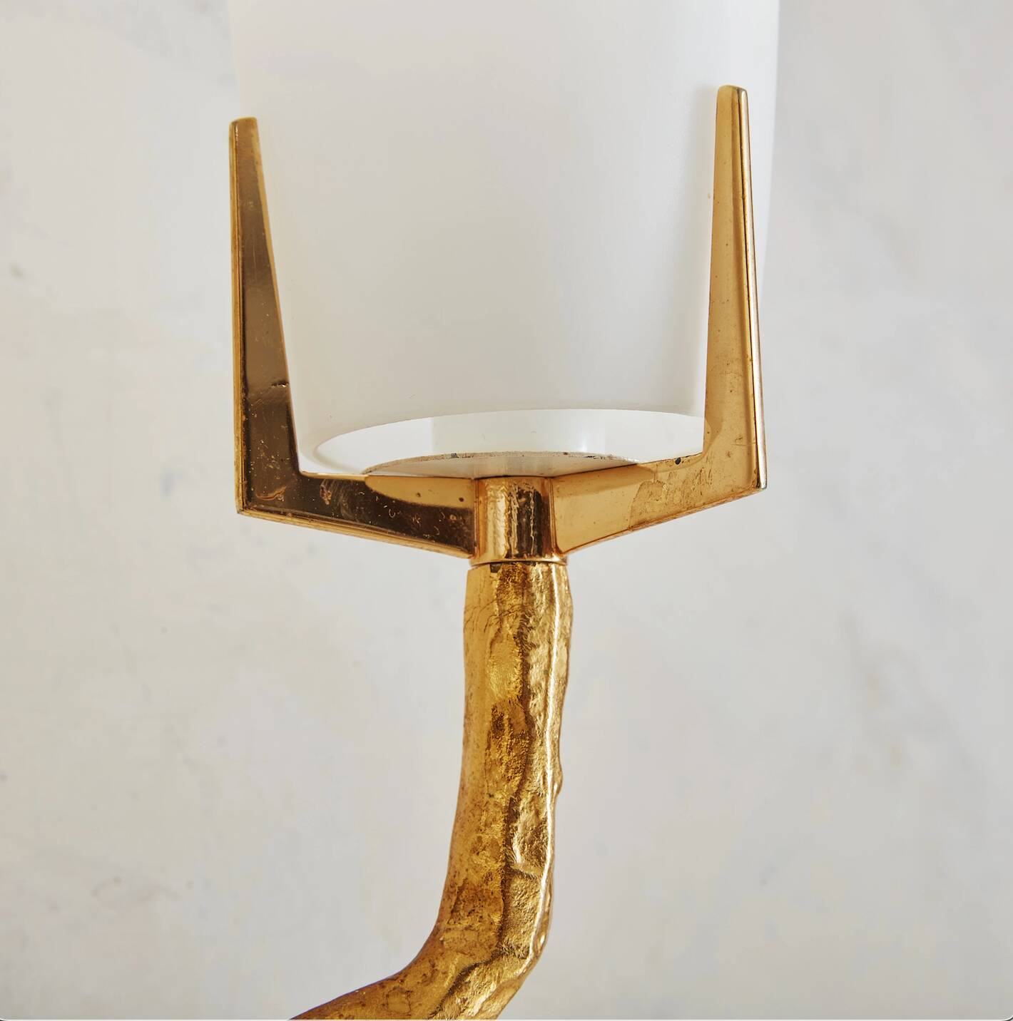 Pair of wall lights by Maison Arlus by Felix Agostini in bronze.