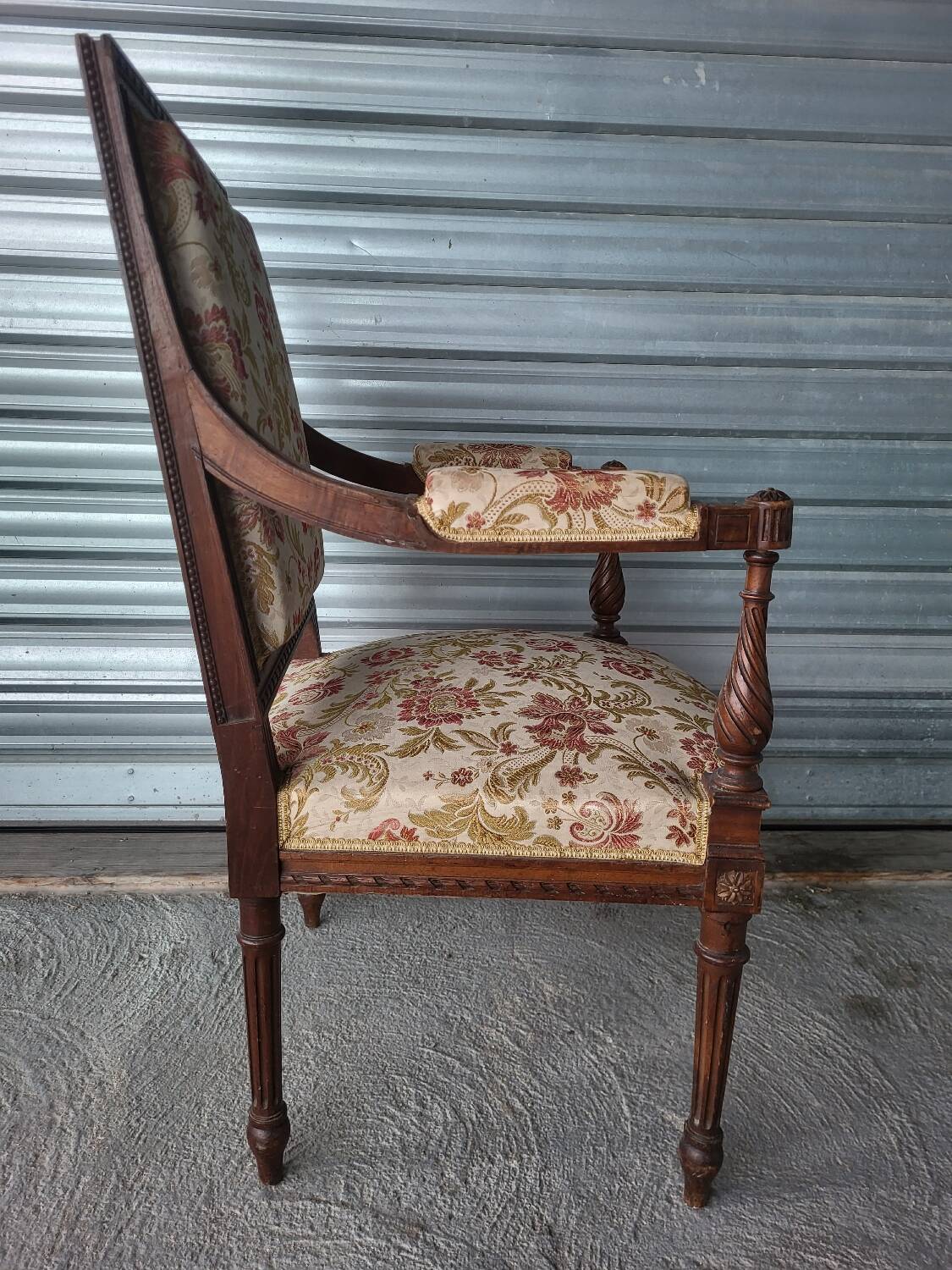 Authentic antique Louis XVI style armchair in good condition.