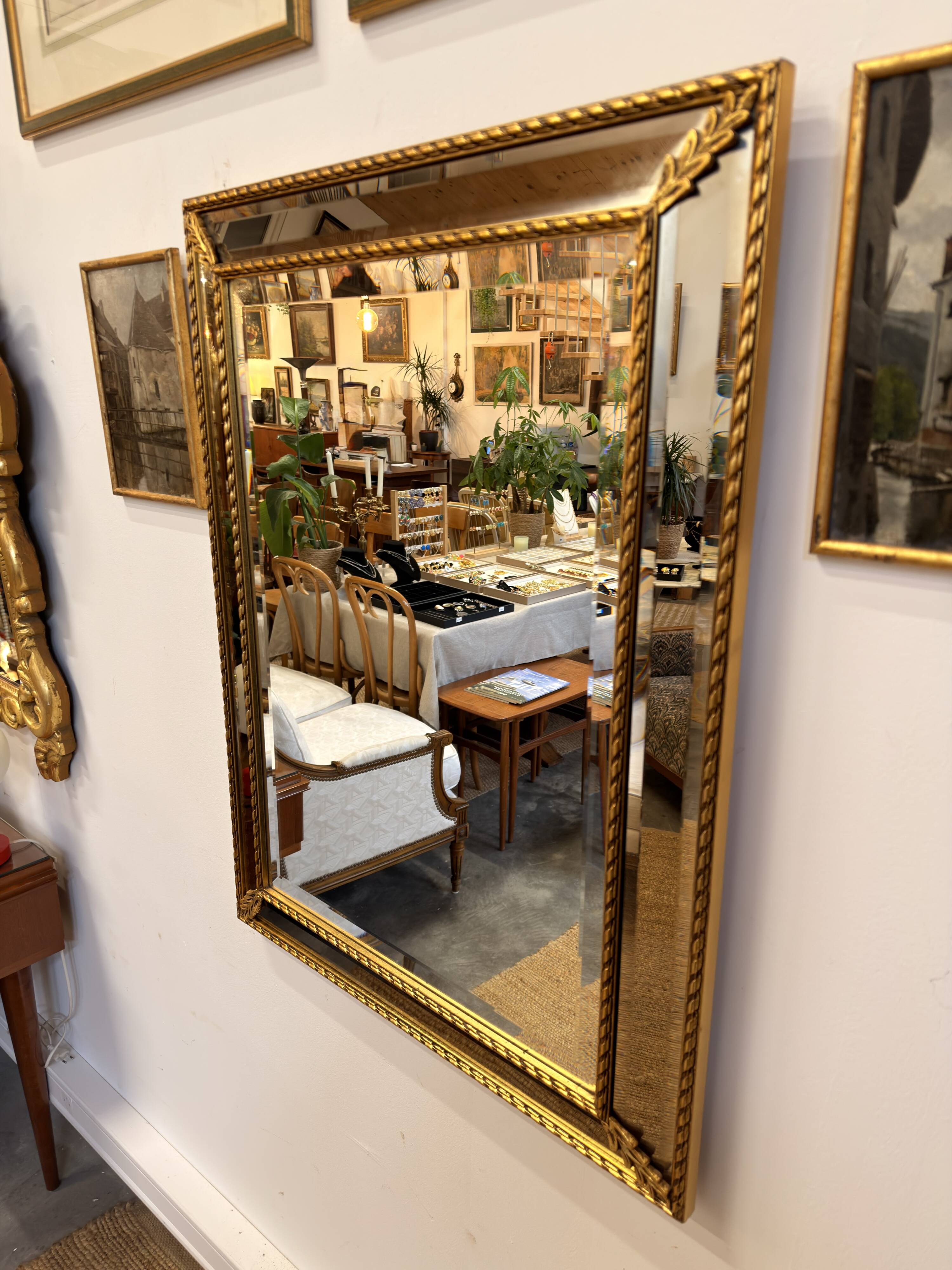 Miroir ancien biseauté doré style Louis XVI