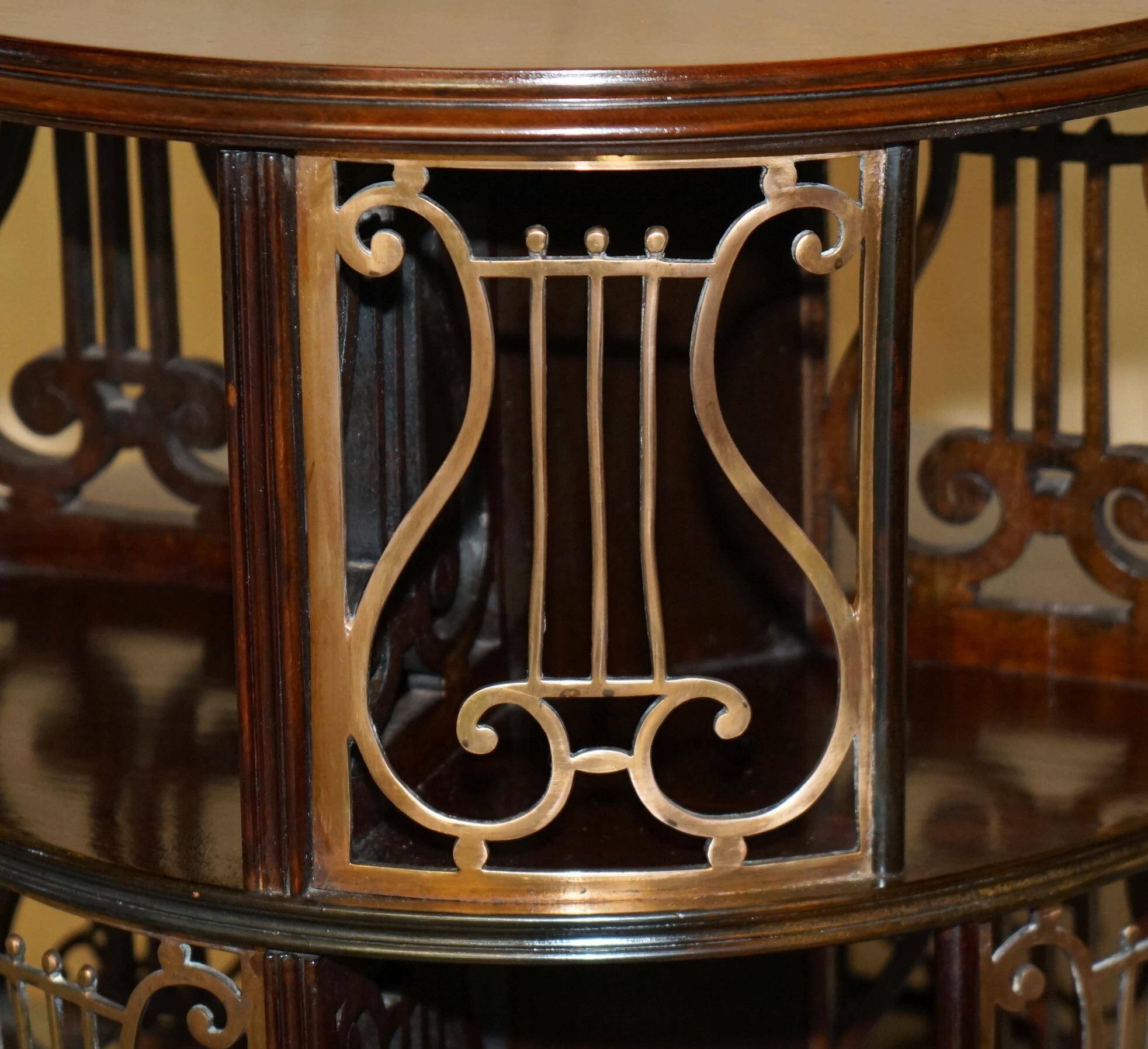 Restored Victorian library table in hardwood and brass.