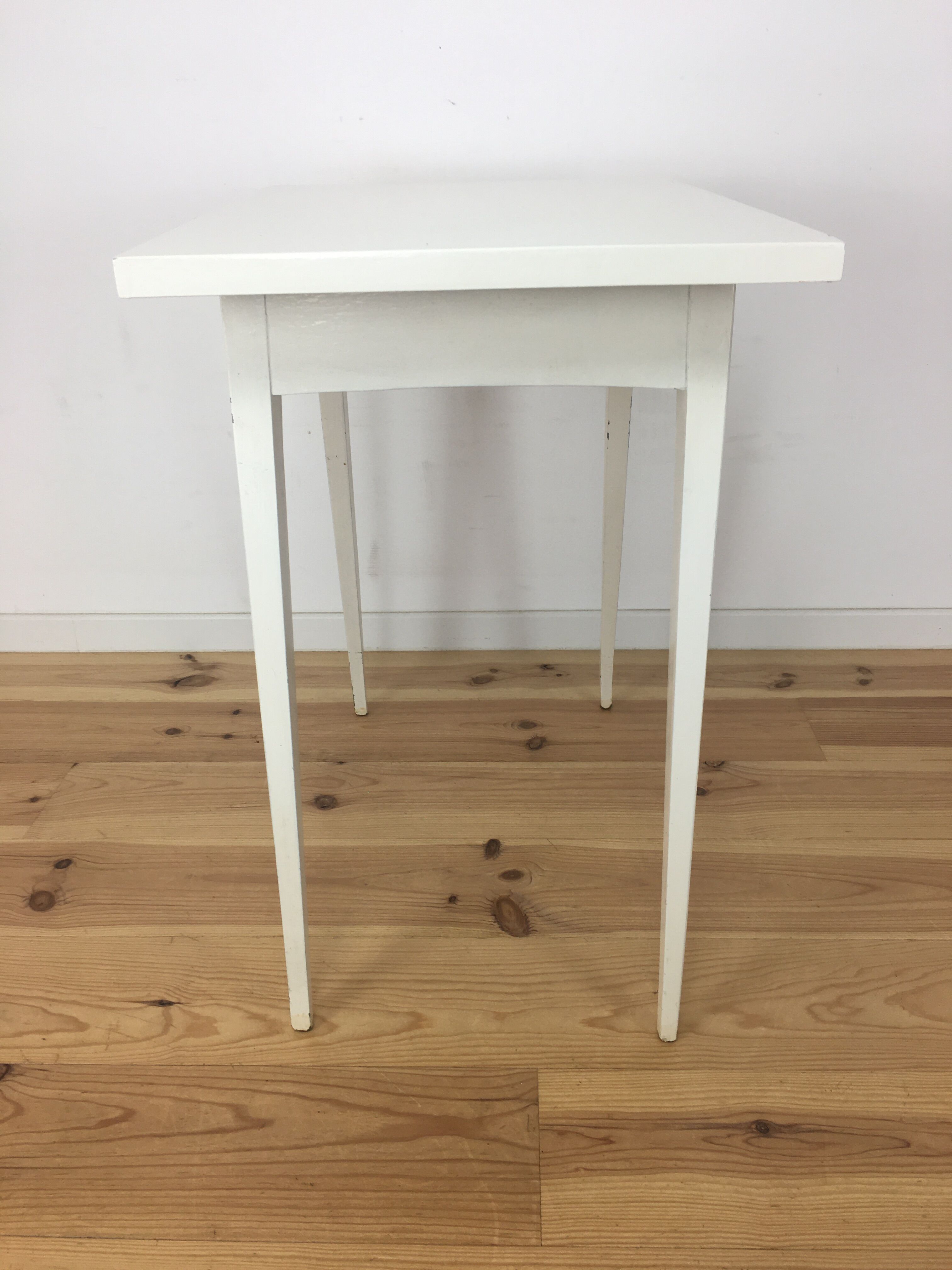 White wood desk foot compass