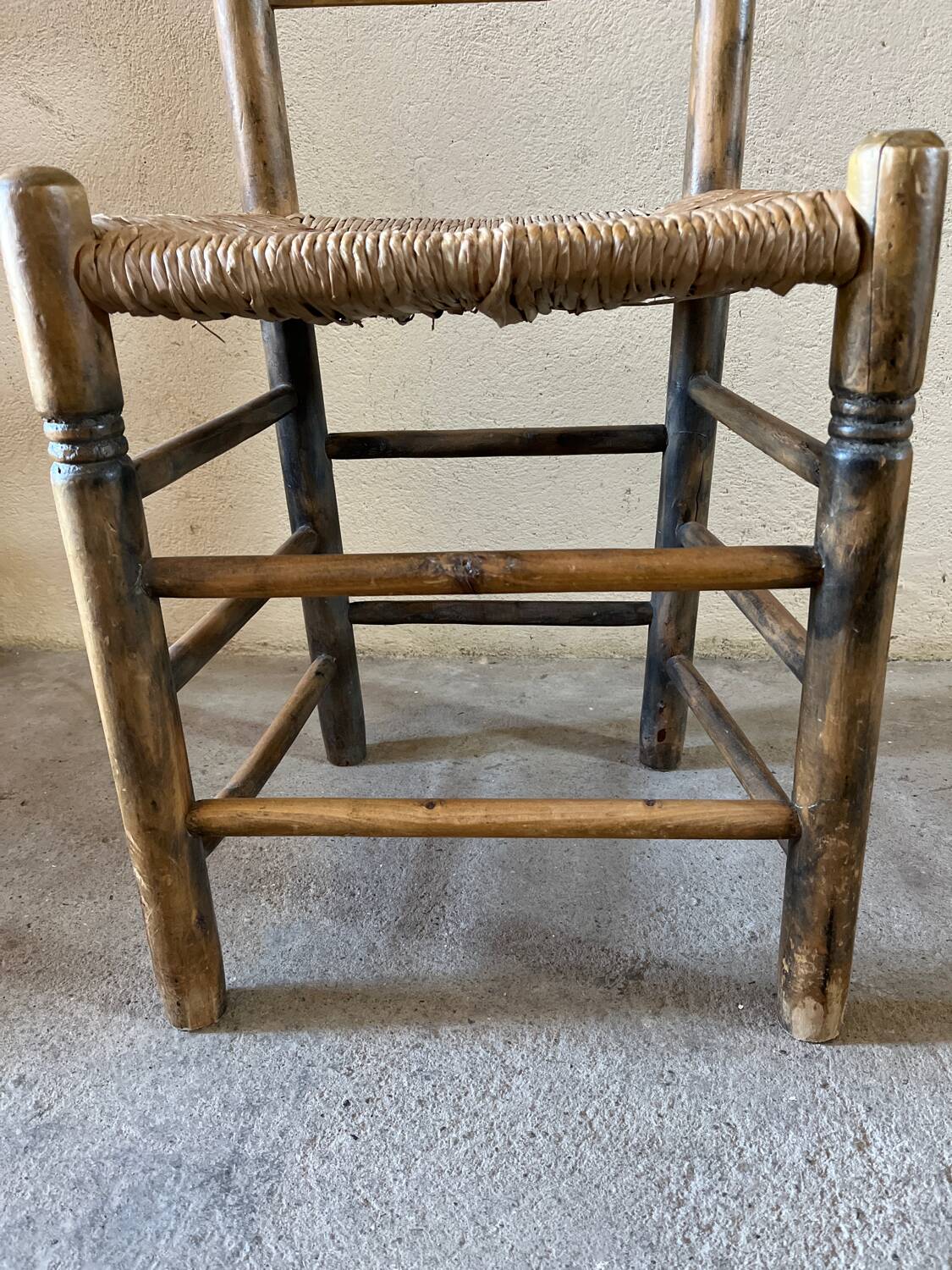 Old turned and stuffed wooden chair