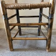 Old turned and stuffed wooden chair