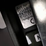 A pair of wall lamps from Eglo, in copper color and black.