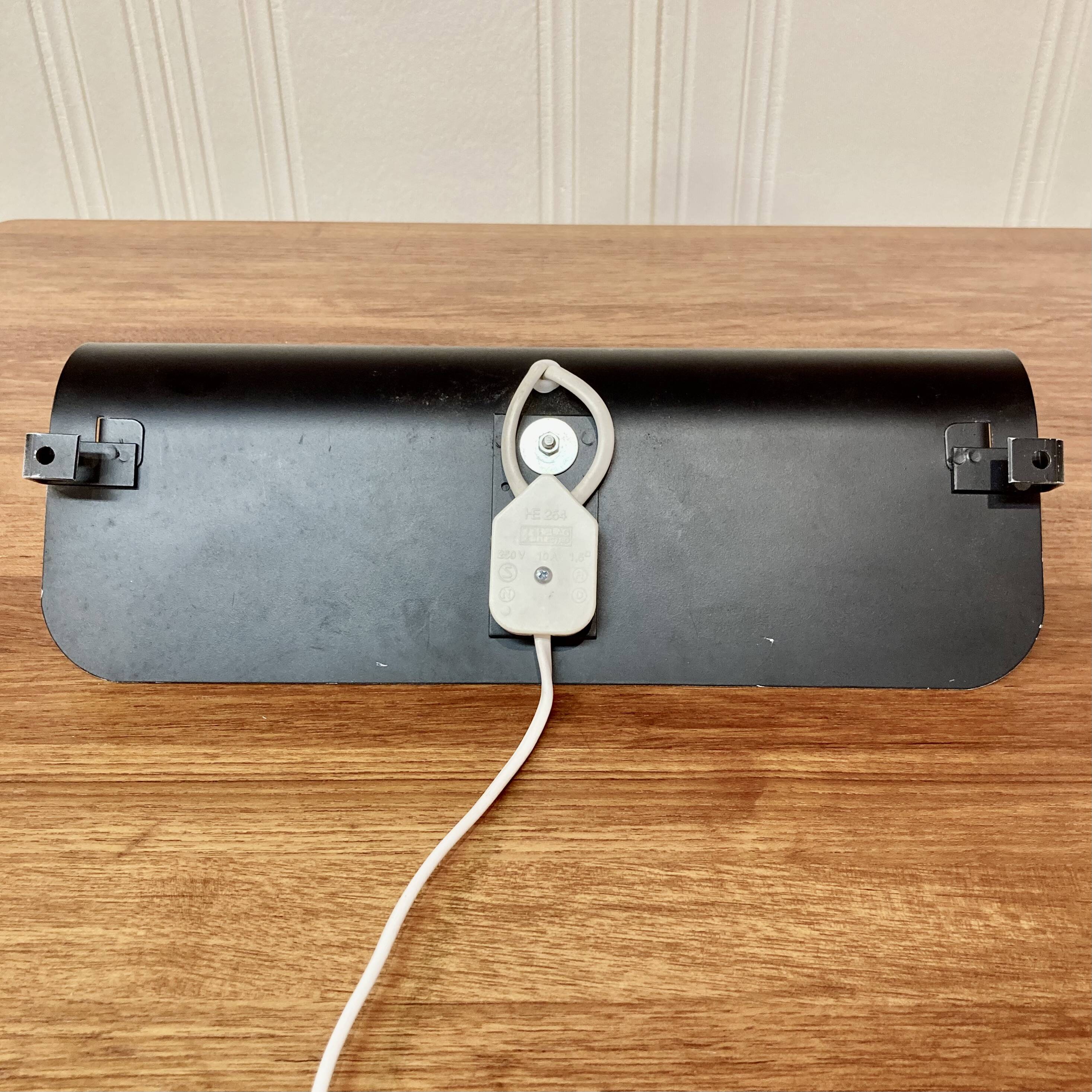 Pair of large scandinavian design steel wall lights 1970.
