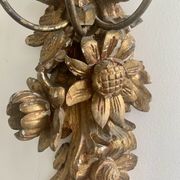 Carved wall lamp in wood of the seventeenth century