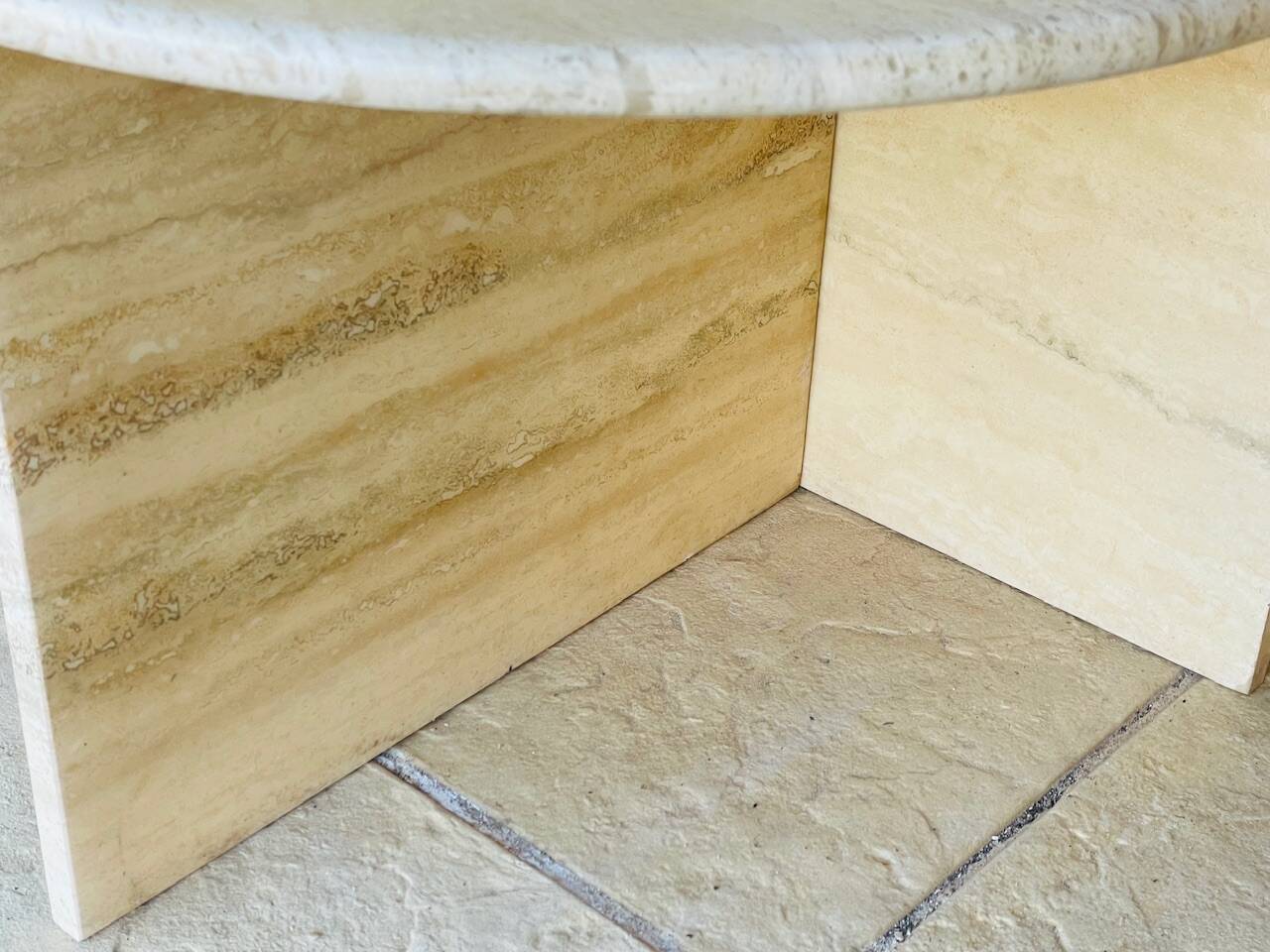 Vintage side table in travertine, circa 1980s.