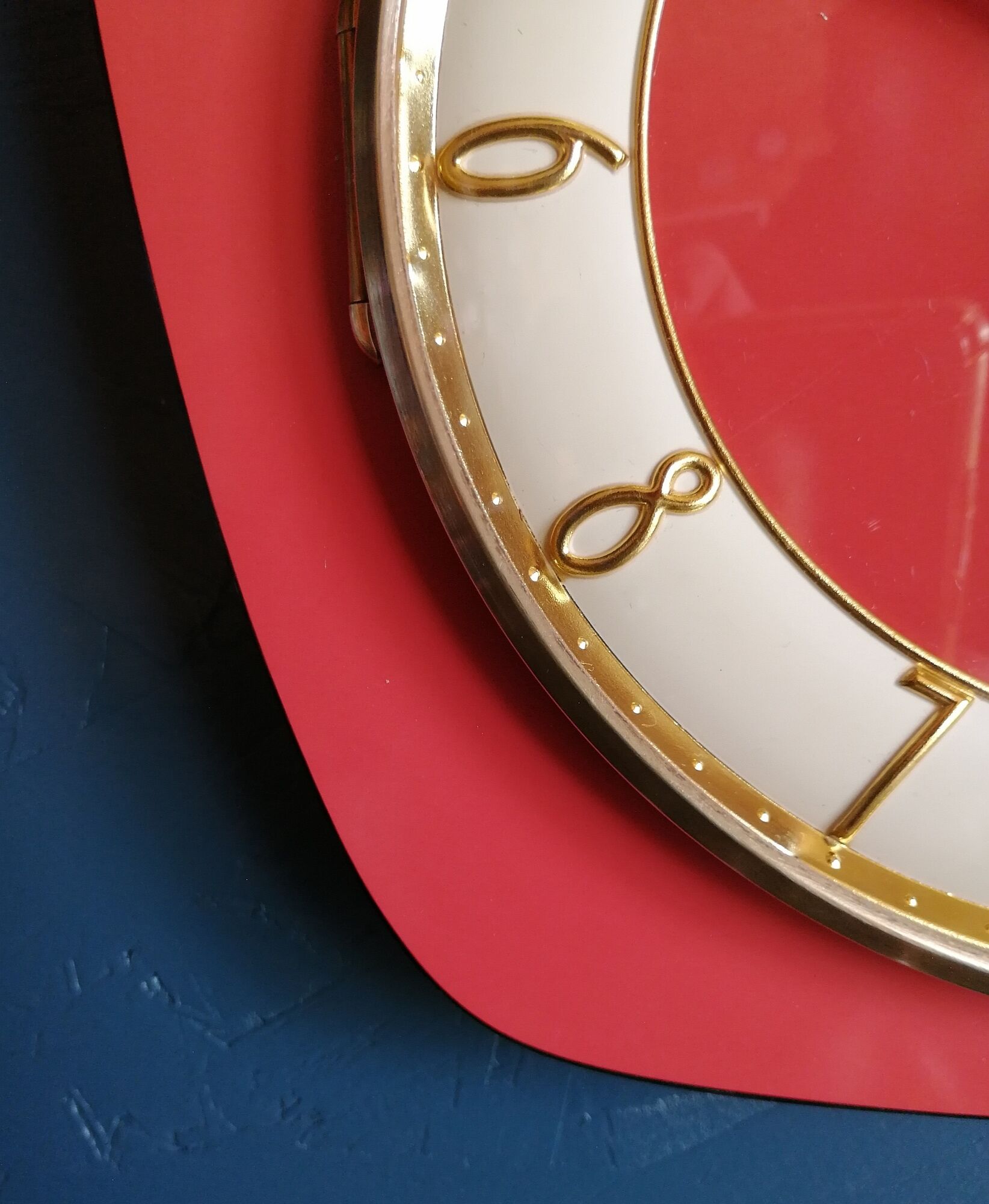 Vintage formica silent wall clock "English red Lutetia"