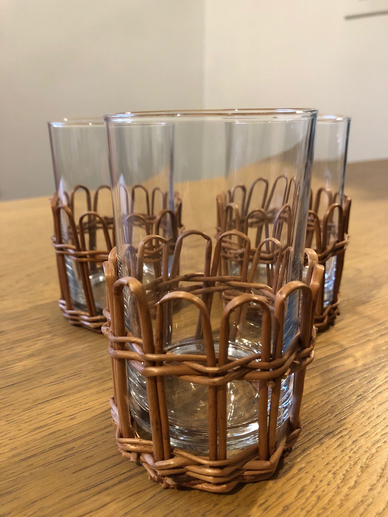 Set of 7 bases of braided rattan glasses and 3 glasses