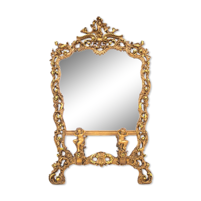 Un grand miroir à cadre doré, Italie, première moitié du XXe siècle.