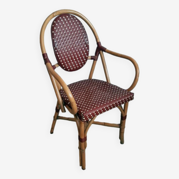 Vintage Parisian bistro armchair in rattan/bamboo and woven nylon.