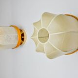 Pair of "cocoon" wall lights, polymer and pine, Italy, 1970