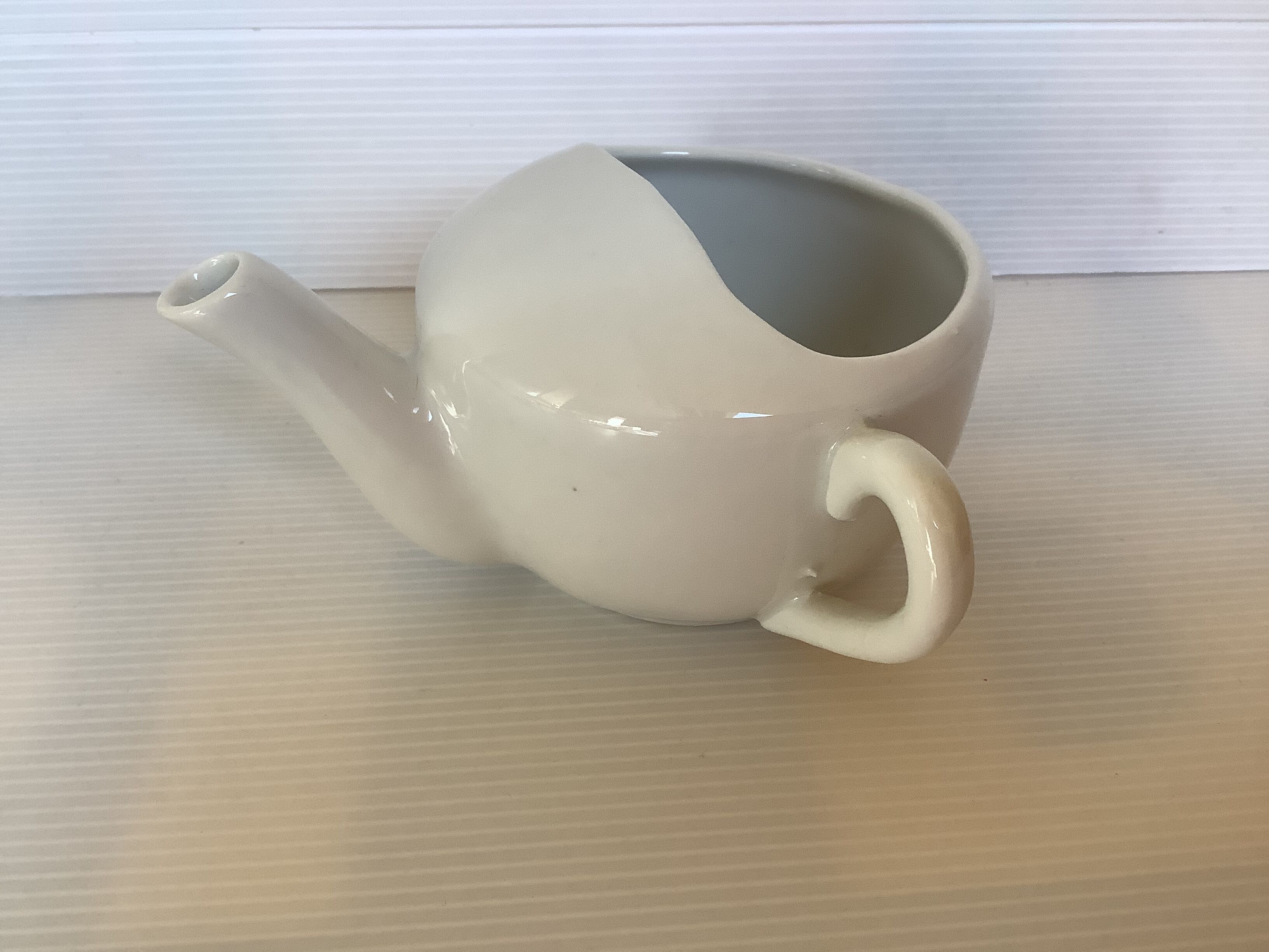 Old baby bottle sauceboat