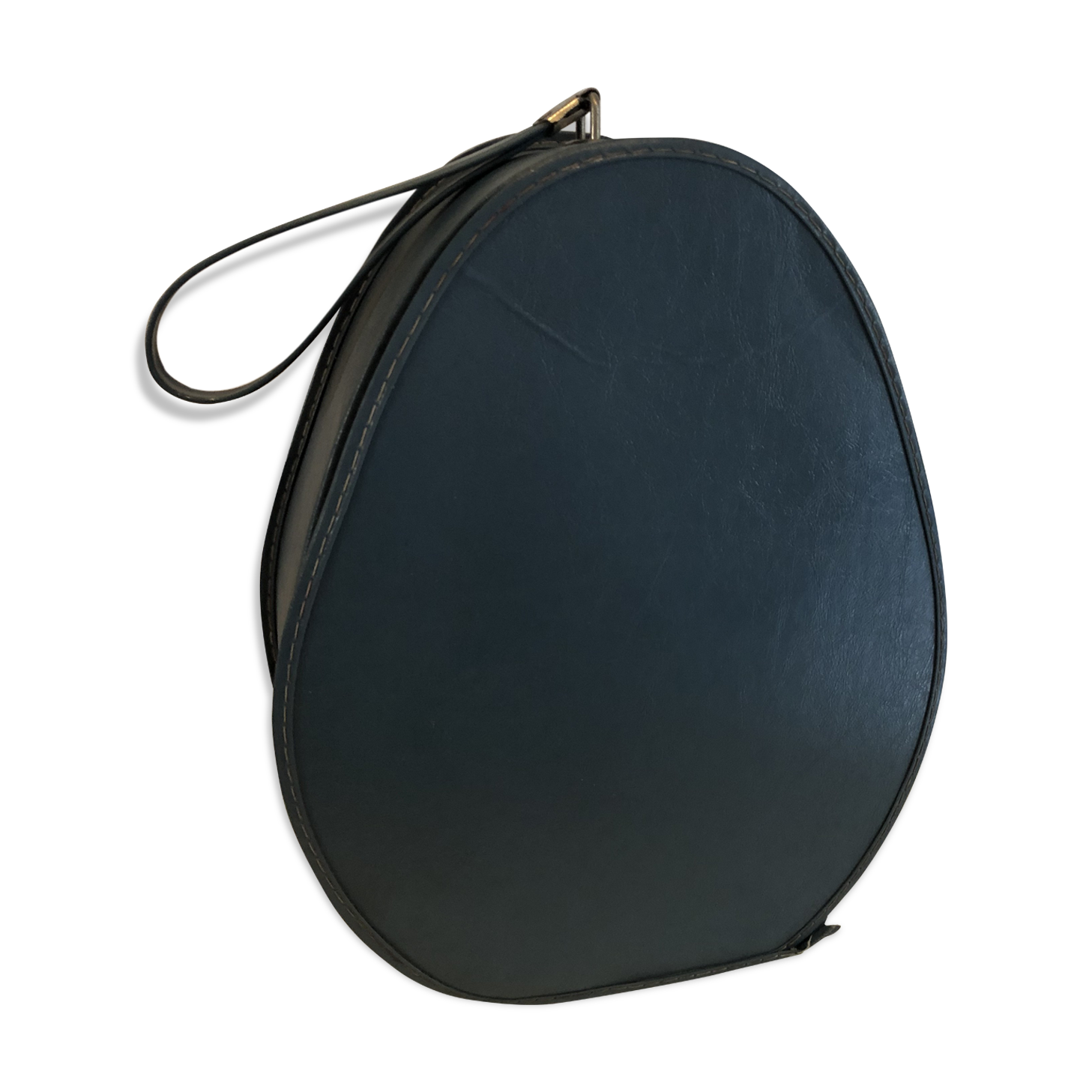 Suitcase has an air hostess hat