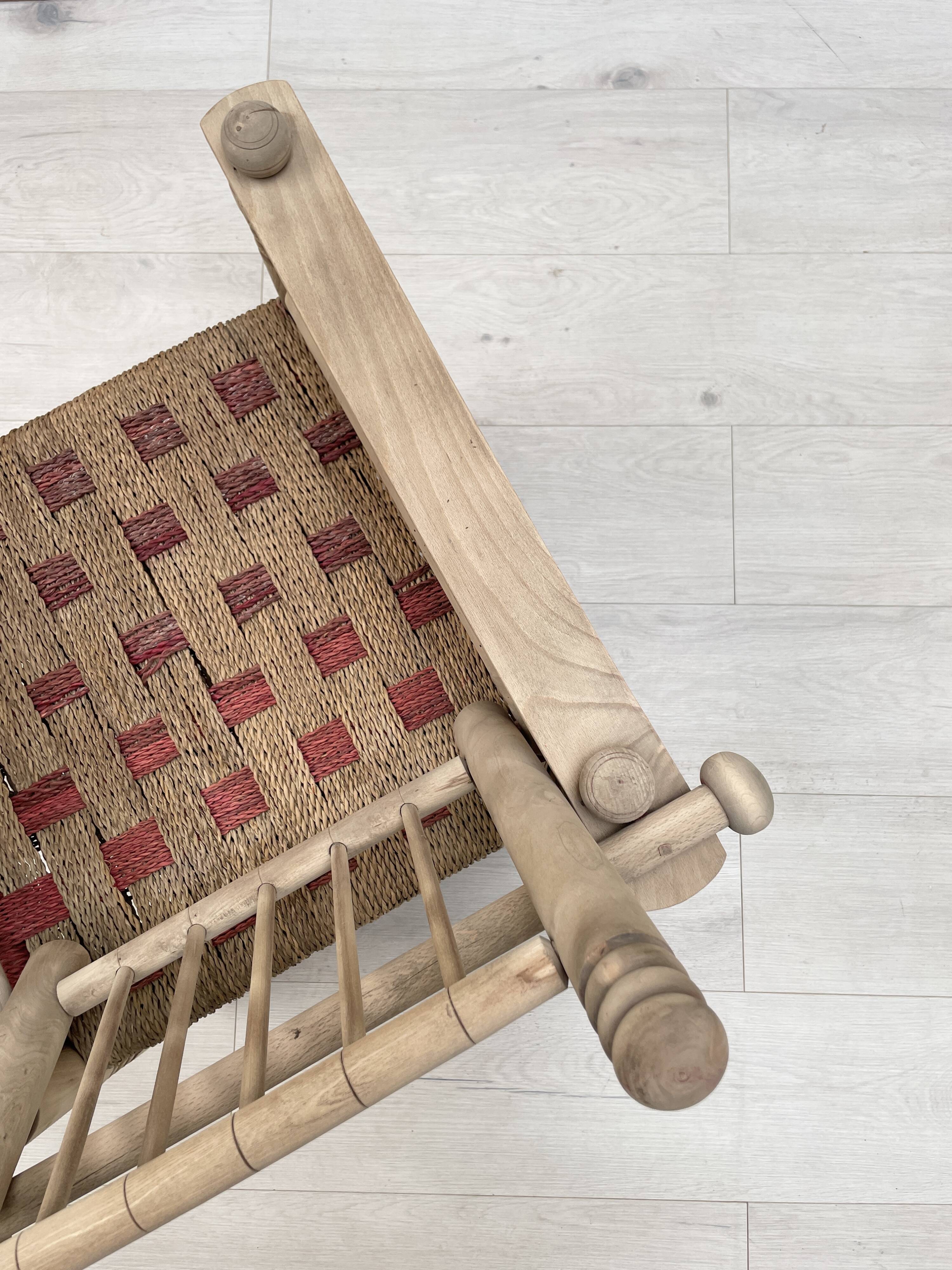 Pair of wooden armchairs and ropes