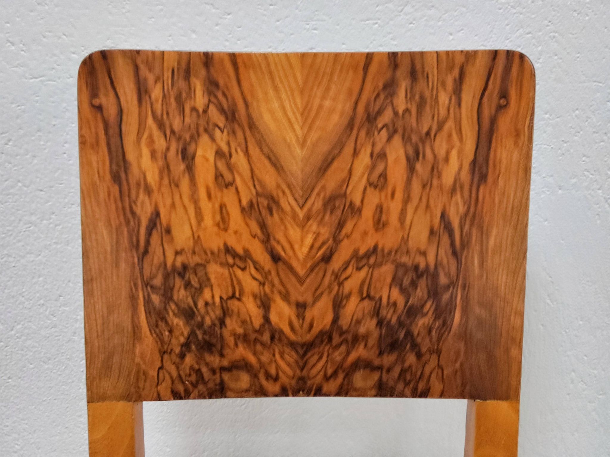 Set of six Art Deco dining chairs in walnut root veneer, 1940s.