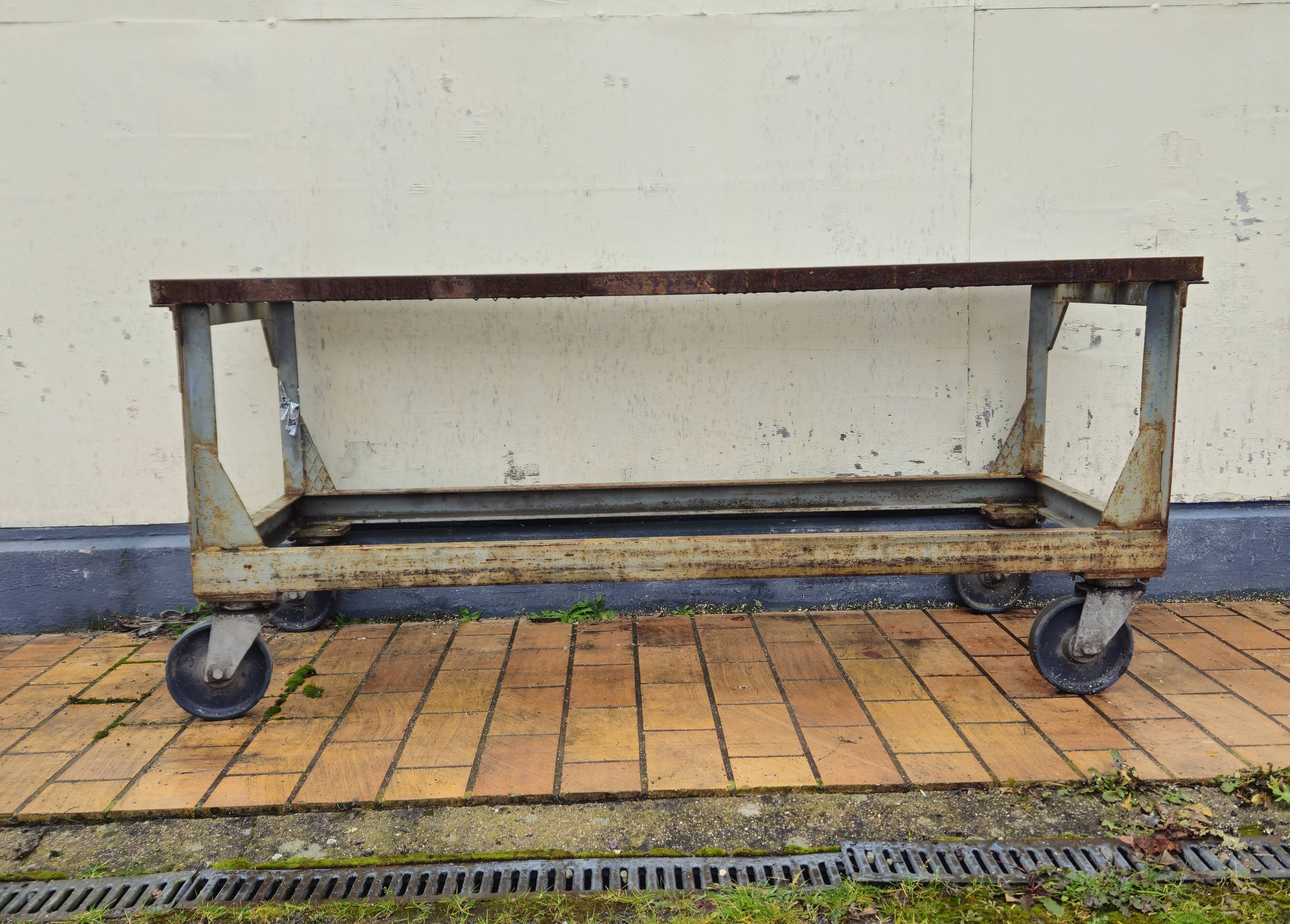 Metal industrial table on wheels, mid-20th century