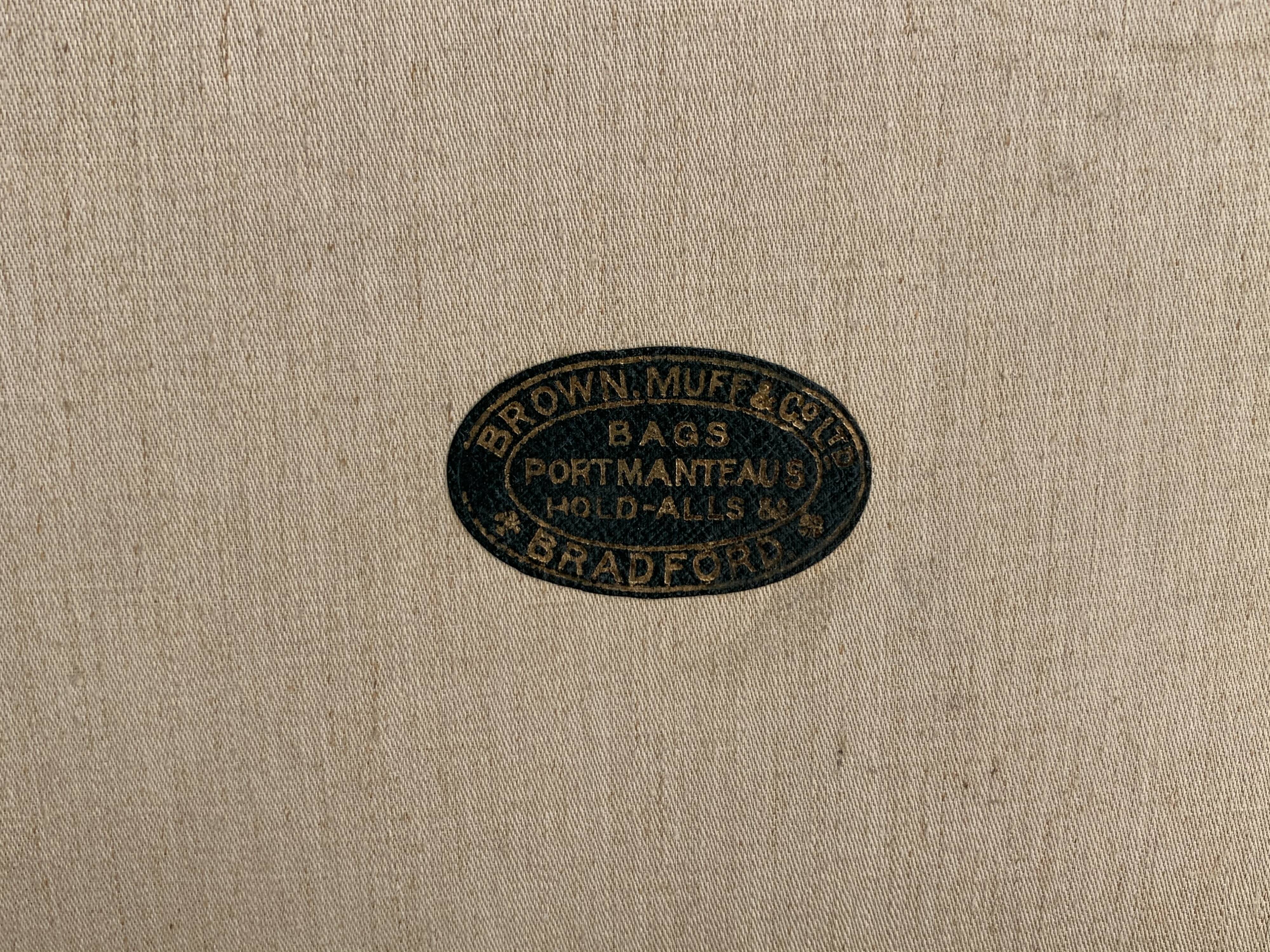 Rare old English suitcase stamped with the royal crown