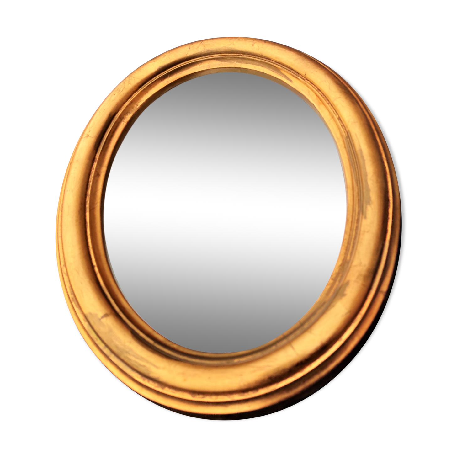 Oval mirror of 30 x 24 cm with its golden entourage of biedermeier
