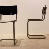 Ensemble de six chaises industrielles en contreplaqué Gispen dans un cadre gris et wengé.