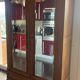 Walnut wardrobe with mirror doors.
