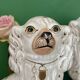 Pair of Staffordshire-type dogs in white and gold ceramic