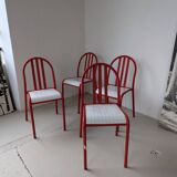 Set of 4 modernist red metal chairs