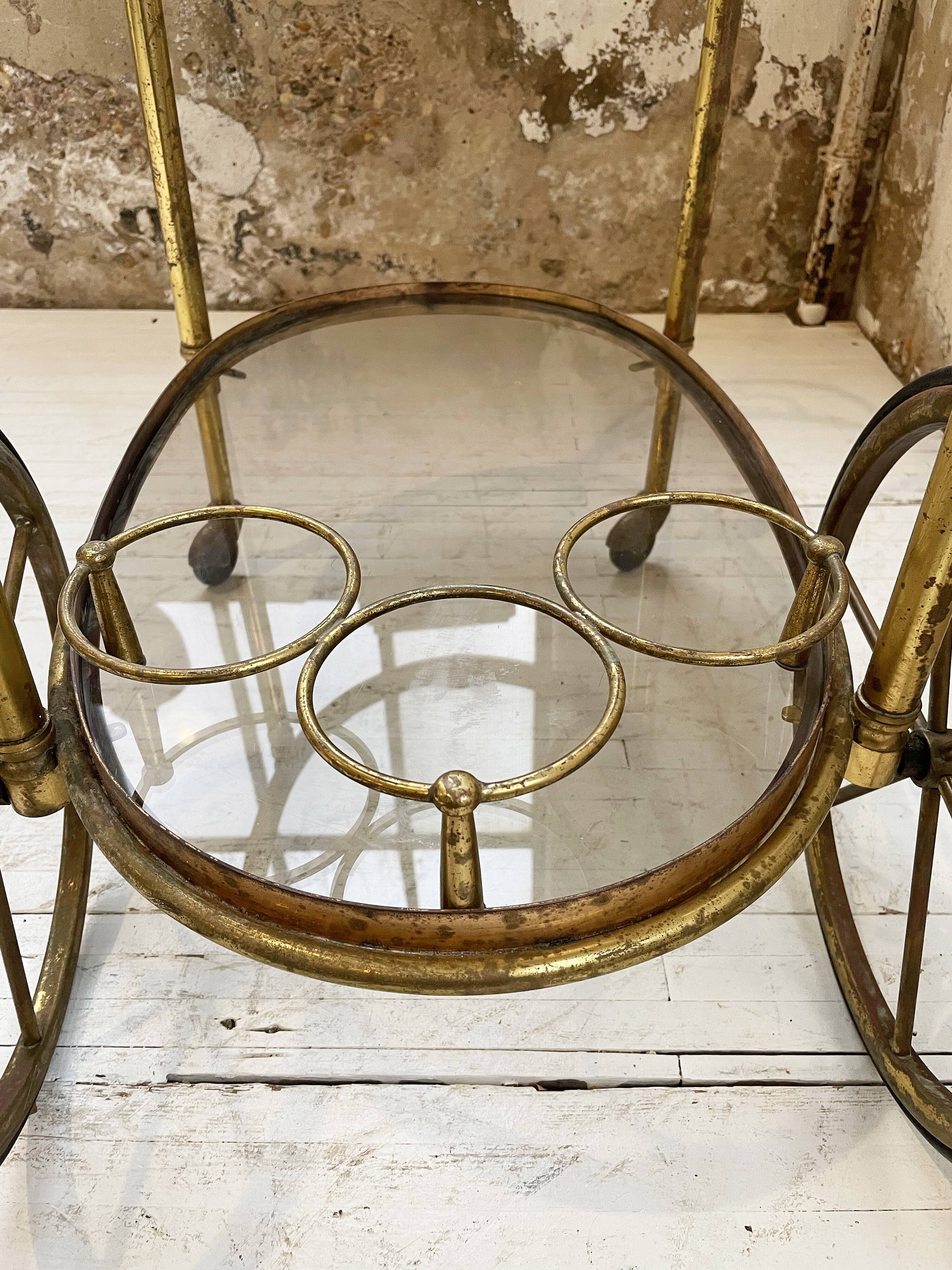 Cart serves brass bar