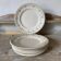 Assiettes plates Longwy modèle "Violetta" , début XXe