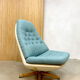 Vintage design swivel chair and ottoman