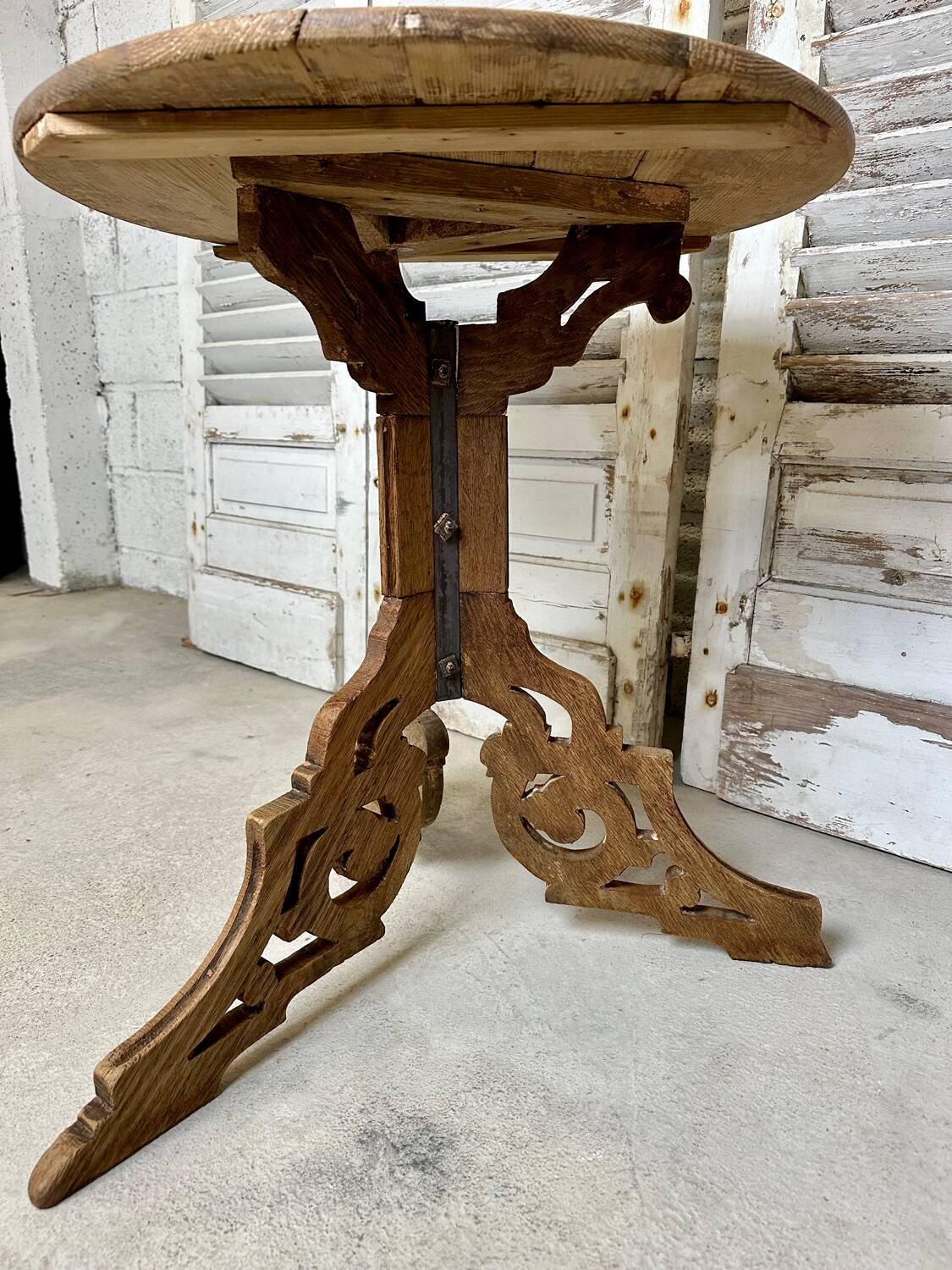 Raw wood pedestal table