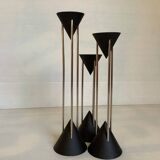Trio of vintage black candlesticks