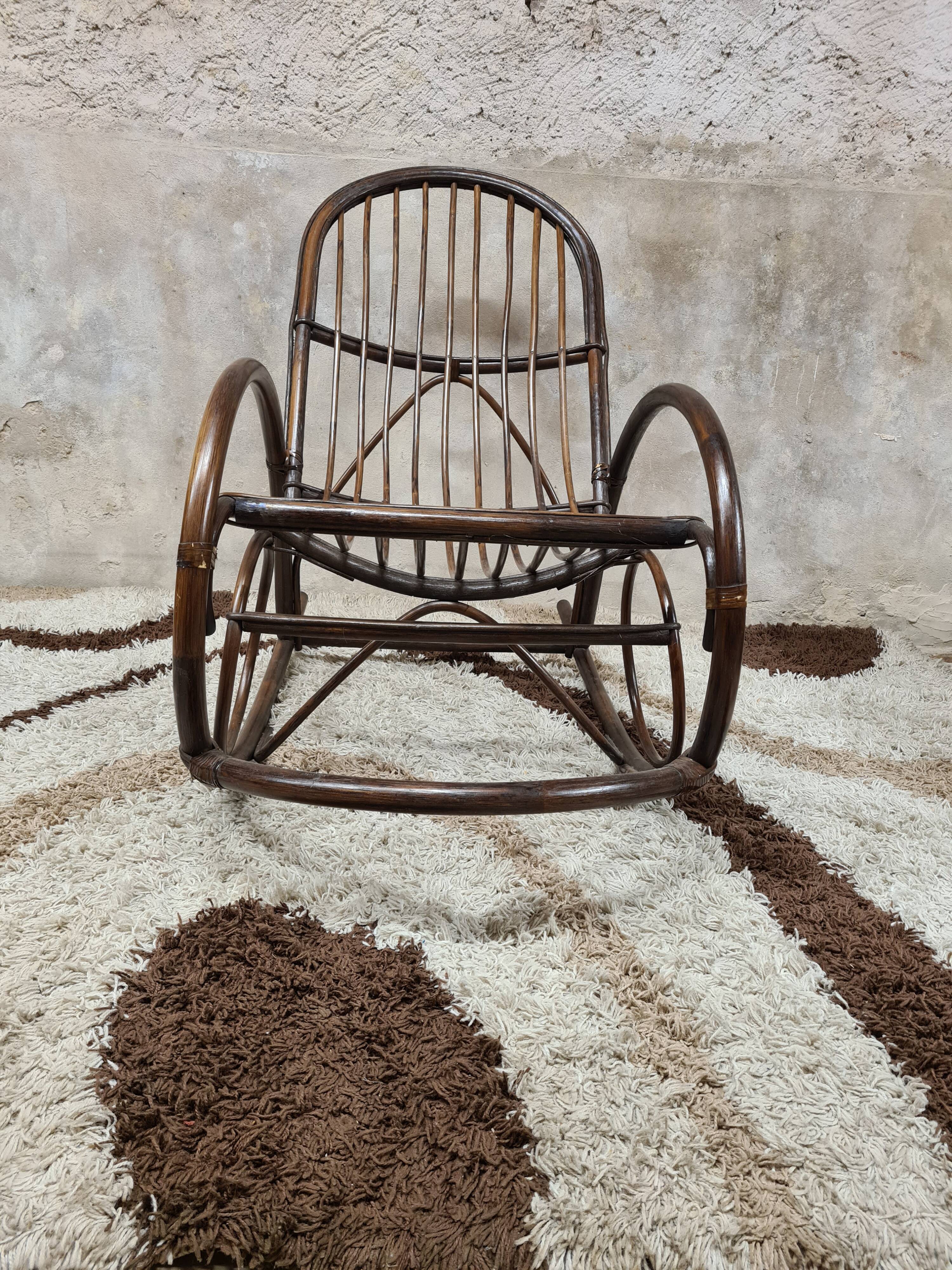Rocking-chair in rattan bamboo 1970 vintage