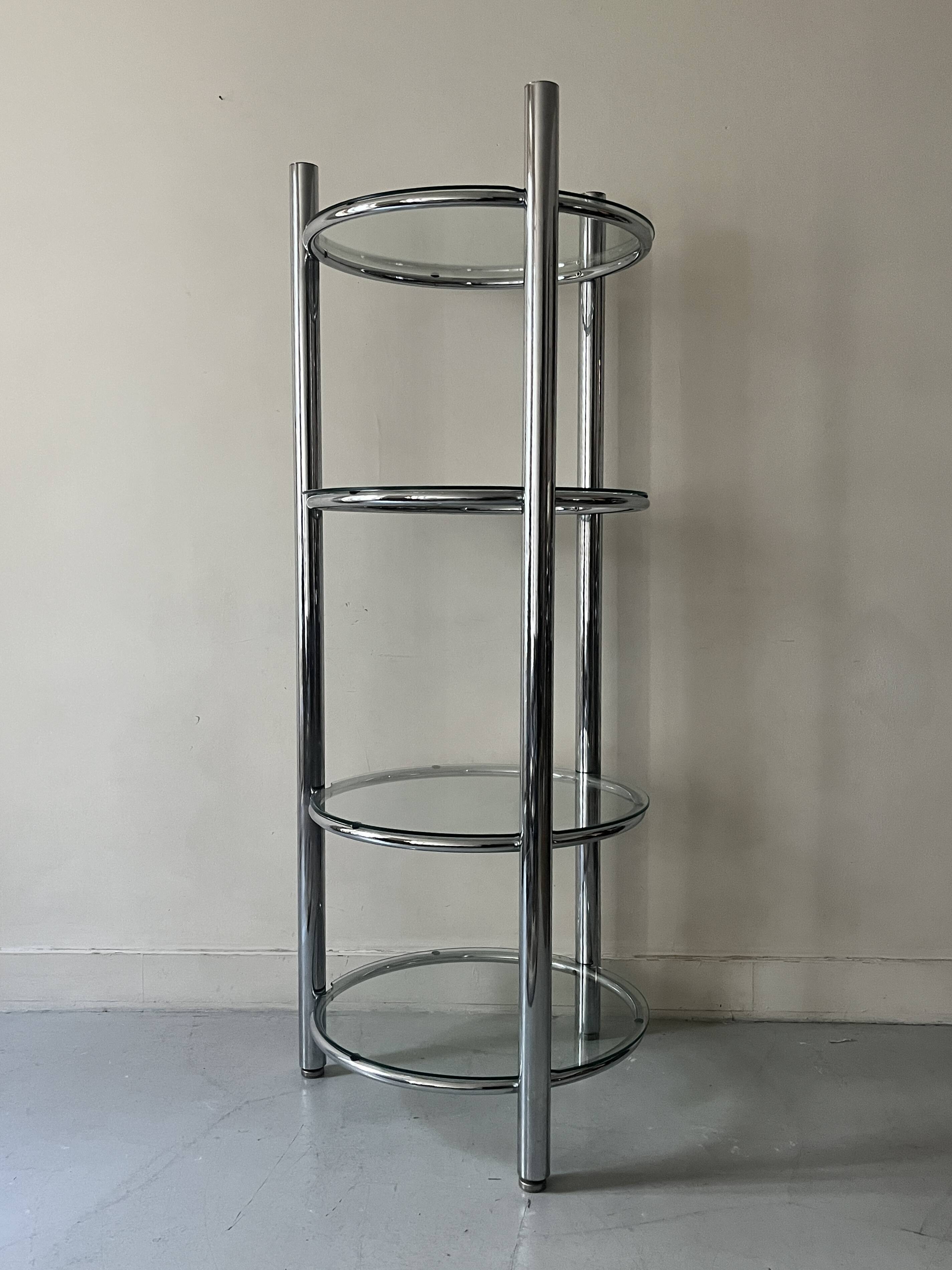 Round tubular bookcase in chrome and glass, 1970 design