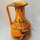 Orange ceramic jug