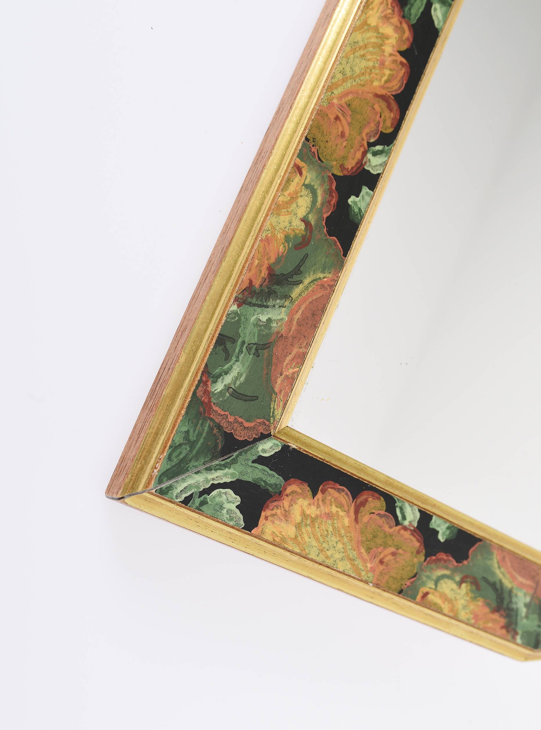 Old vintage octagonal mirror, floral patterns, green and gold