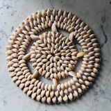 Trivet made of seashells