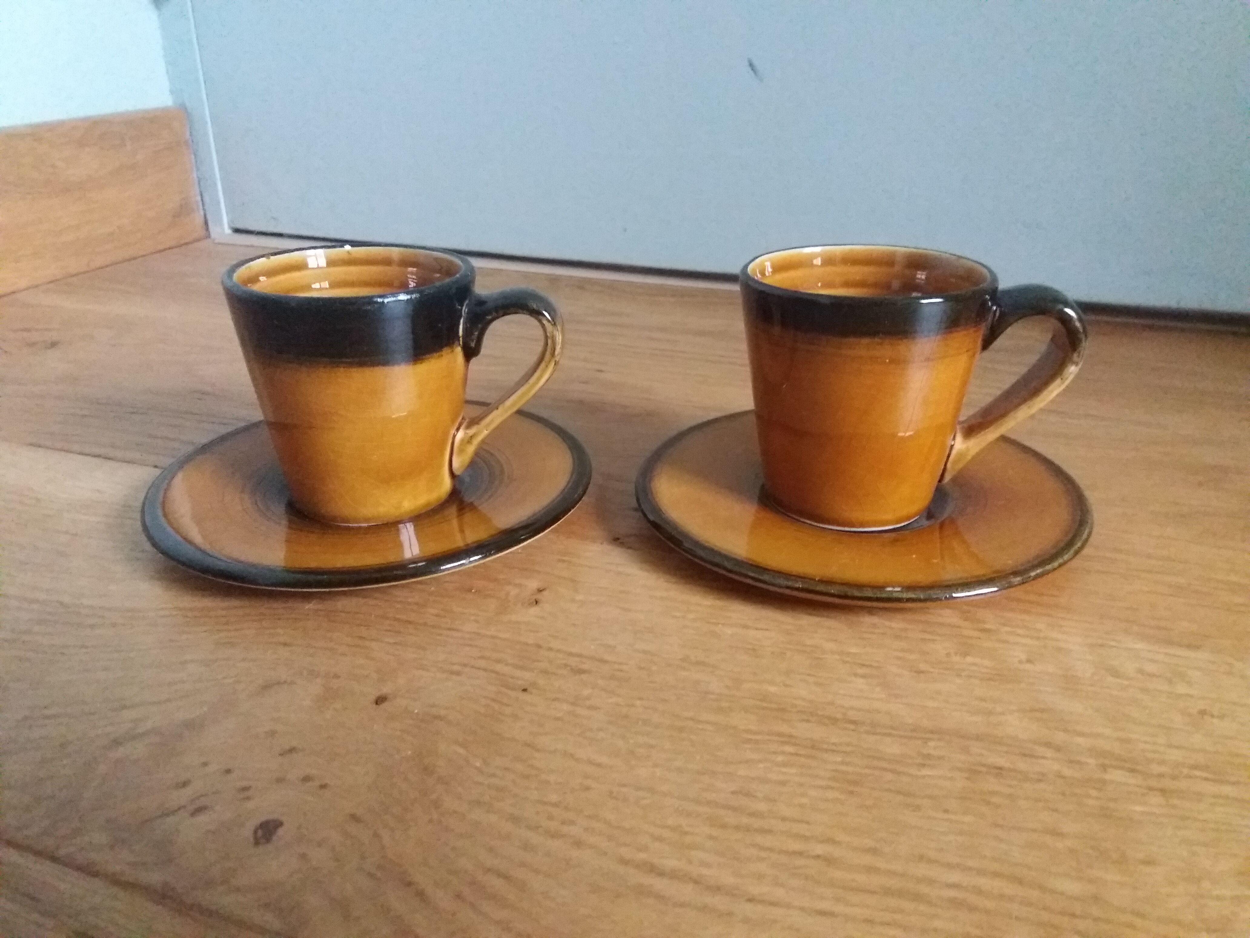 2 Longchamp ceramic coffee cups and saucers