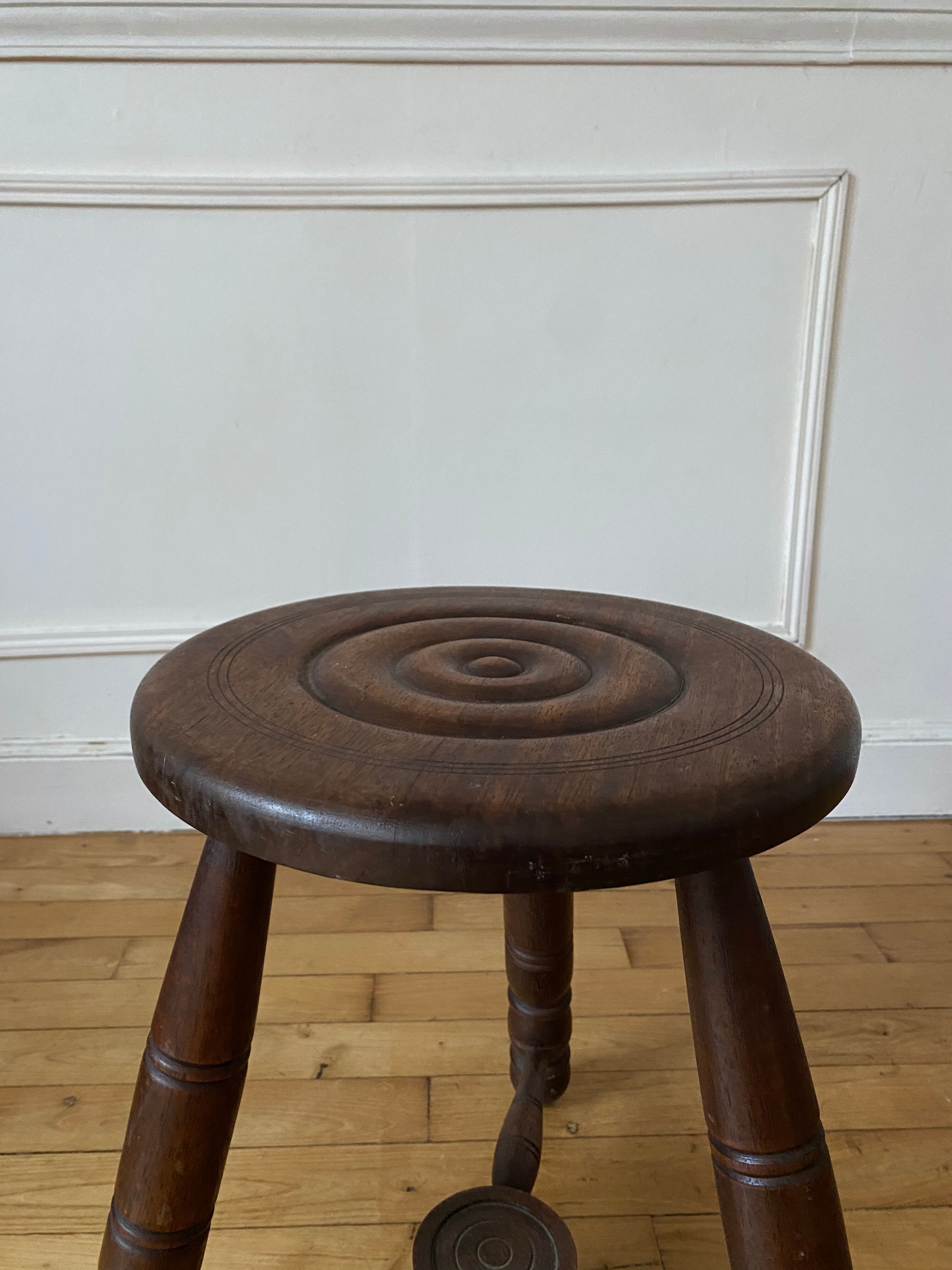 Wooden tripod stool